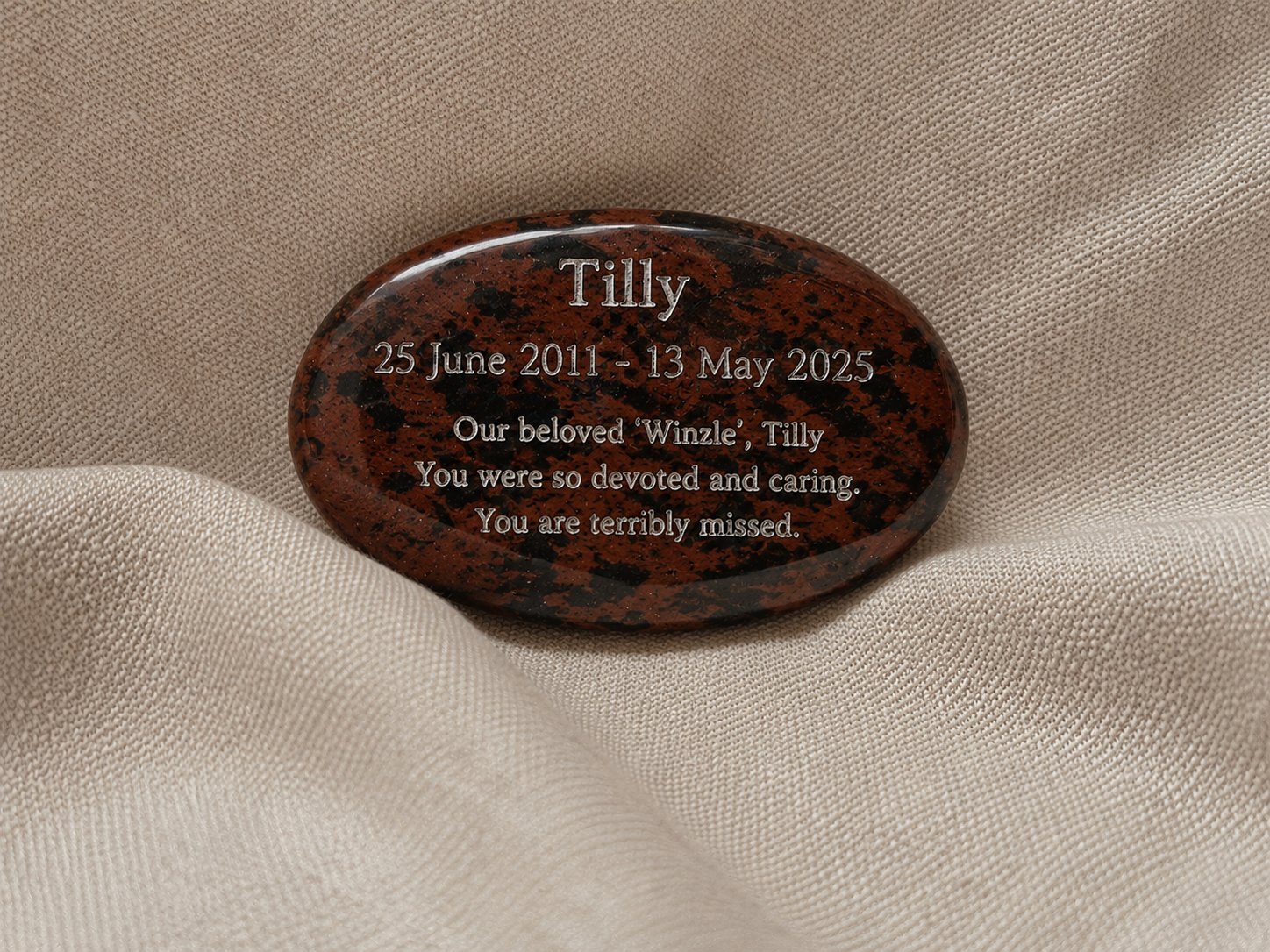 Earthbound mahogany engraved stone